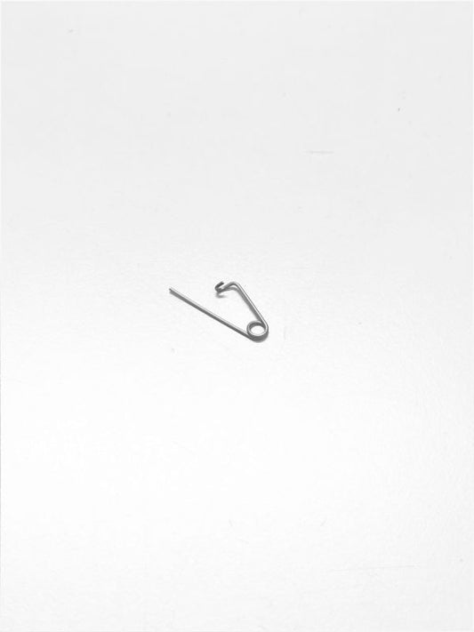 Lås för pinne till bromsbelägg